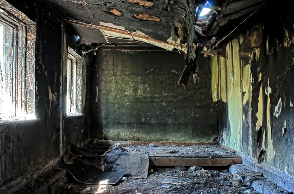 Old abandoned burned house inside hdr