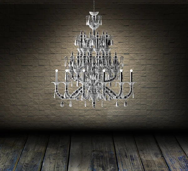 Crystal chandelier hanging in a dark room