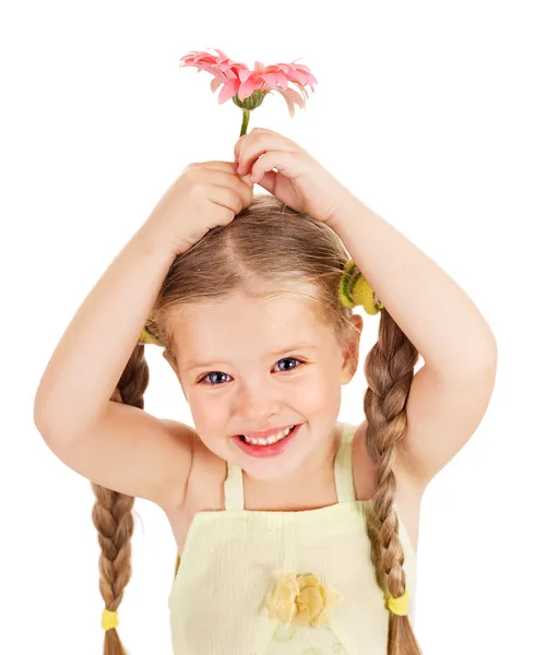 Child holding flower.