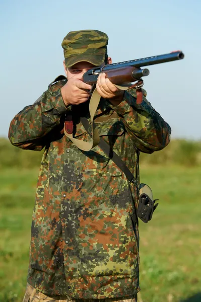 Hunter with rifle gun