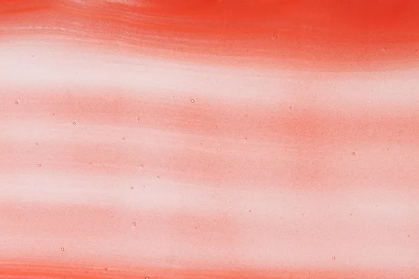 Red shower gel sample, background texture