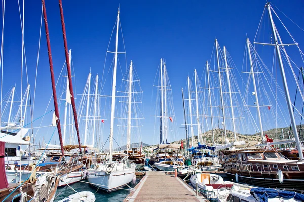 Nice yachts on an anchor in harbor. Bodrum. Turkey.