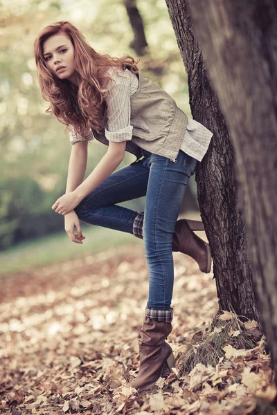 Young slim woman autumn portrait