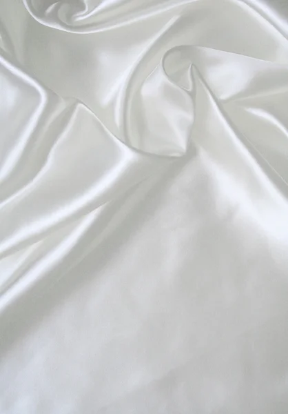 Smooth elegant white silk as wedding background by Oxana Morozova Stock