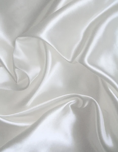 Smooth elegant white silk as wedding background by Oxana Morozova Stock