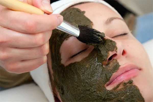 Applying beauty mask