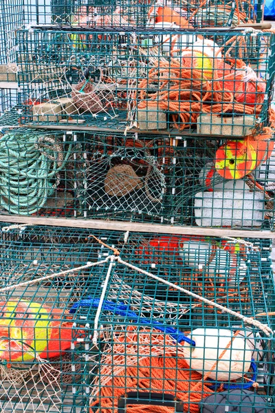Lobster traps and colorful buoys