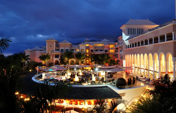 Night illumination of luxury hotel and clouds, Tenerife island,