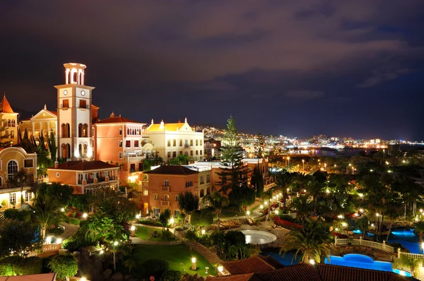 Night illumination of luxury hotel during sunset and Playa de la