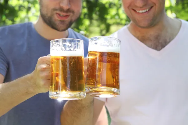 Two men with light beer