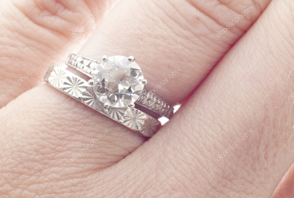 Engagement ring and wedding ring finger