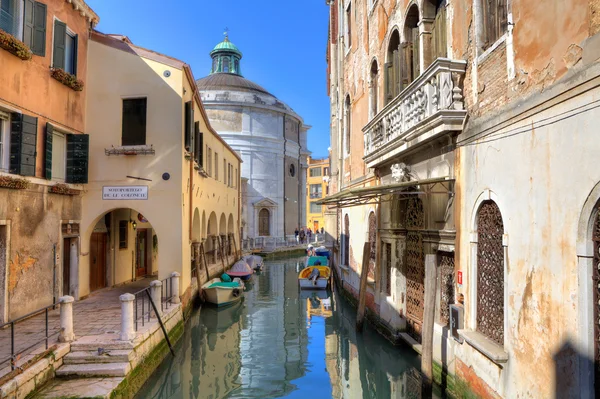 Old houses and small canal in Venice, Italy.