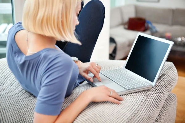 Blond woman with laptop