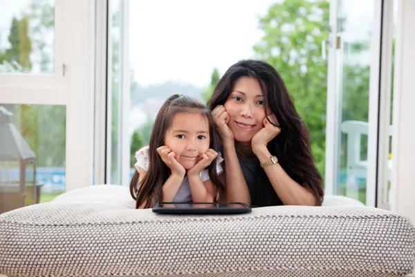 Mother and Daughter with Digital Tablet
