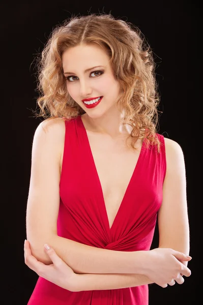 Charming lady in red evening dress