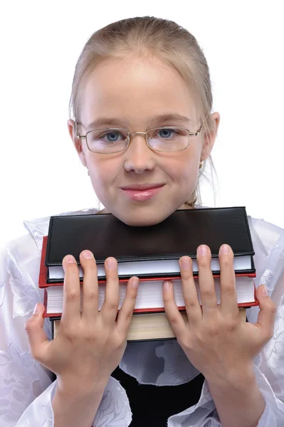 Portrait of little girl holding pale of books by BestPhotoStudio Stock 