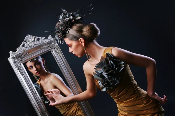 Stylish woman and Mirror
