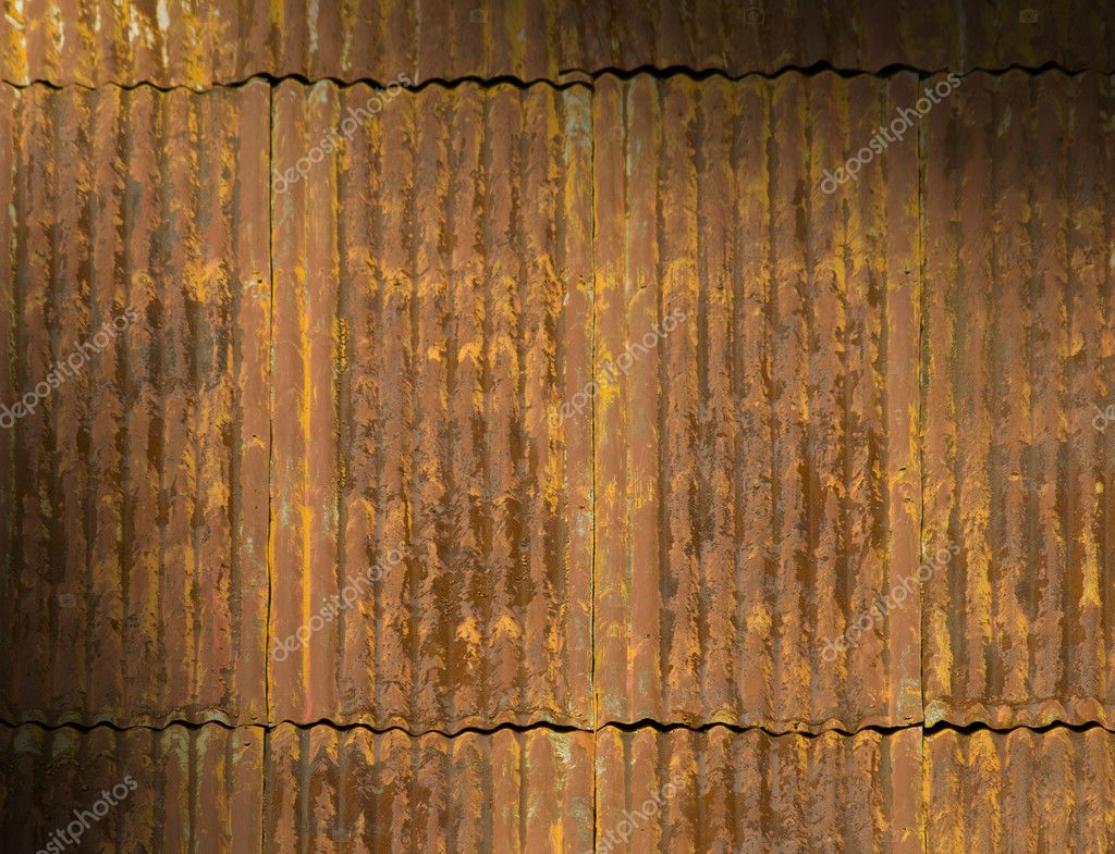  - depositphotos_6431951-Rusty-corrugated-metal-roof-panels-lit-diagonally