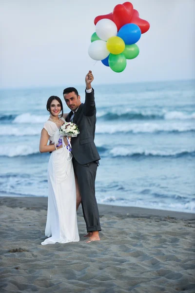 Romantic beach wedding at sunset by benis arapovic Stock Photo