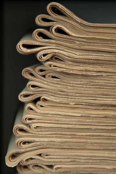 A stack of old newspapers.