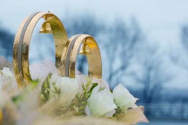 Wedding rings and flowers by Stanislav Komogorov Stock Photo