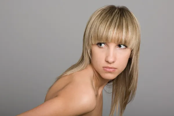 Girl with bare shoulders by Stanislav Komogorov Stock Photo