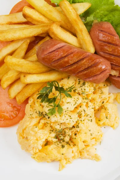 Scrambled eggs, sausage and french fries