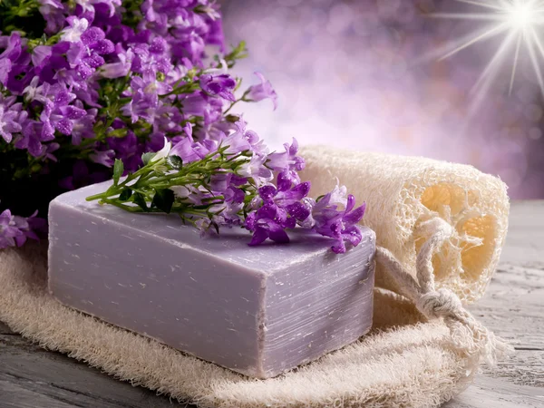 Natural flower soap with scrub sponge spa concept