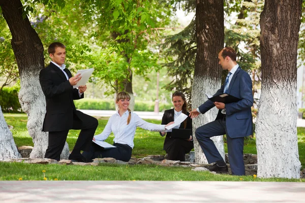 Young business in a city park — Stock Photo #6345025