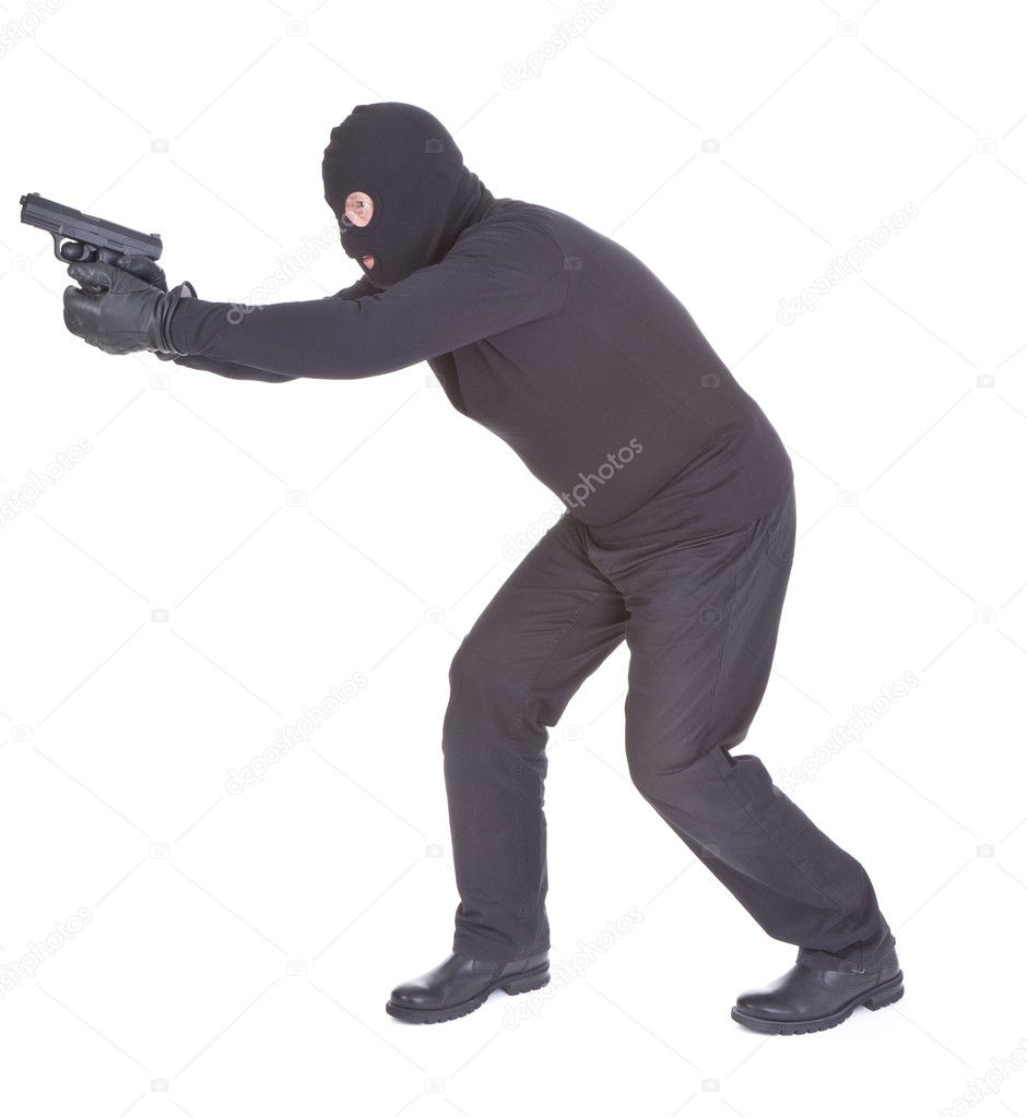 Robber Aiming With His Gun — Stock Photo © Yoka66 #5486257