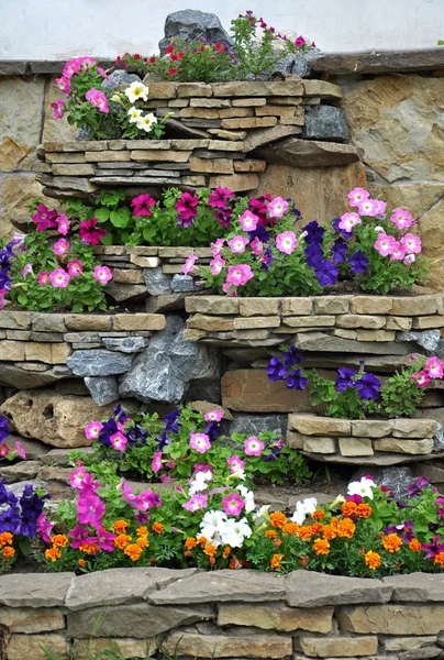 The stone flower bed on the wall