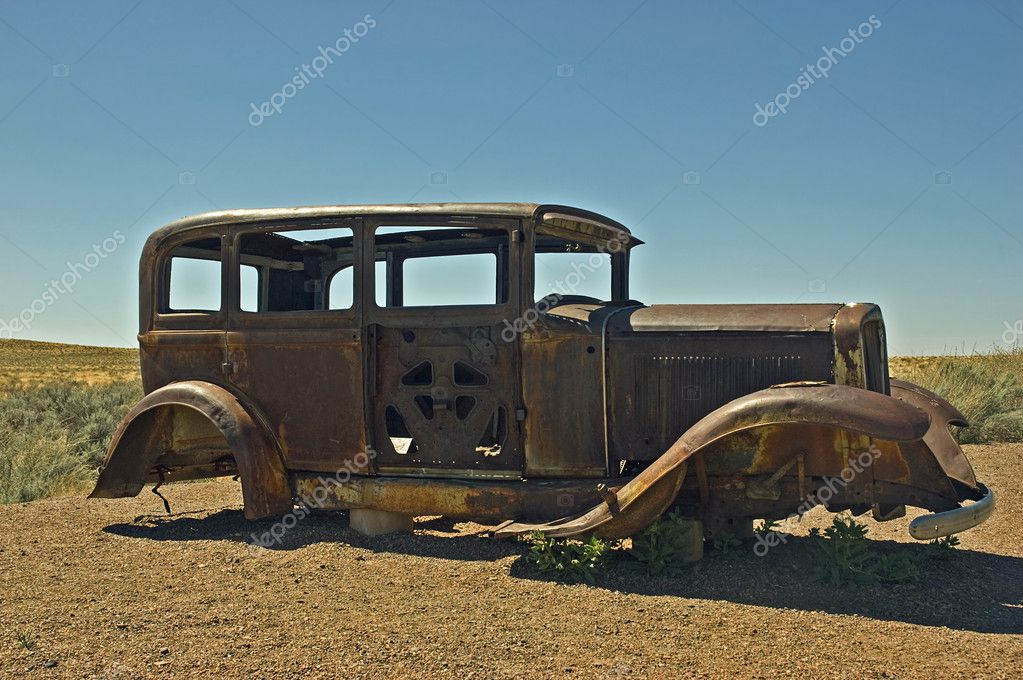 Old rusty car in the desert Arizona
