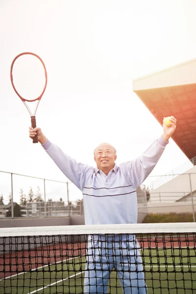 Senior tennis player — Stock Photo #5655443