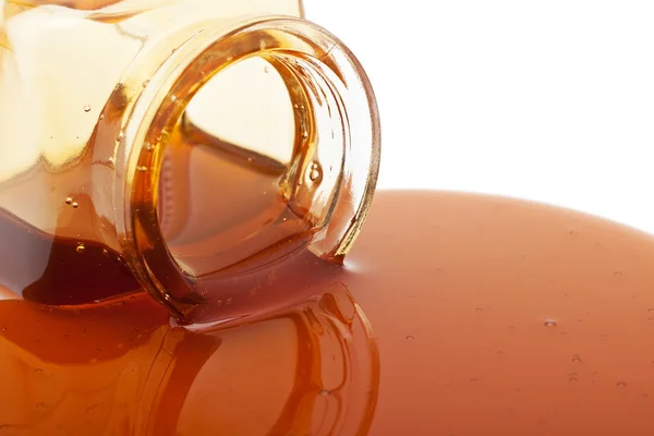 Honey spill from jar