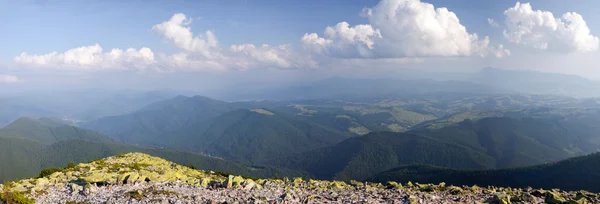 Carpathian mountain scene with cloudy skies