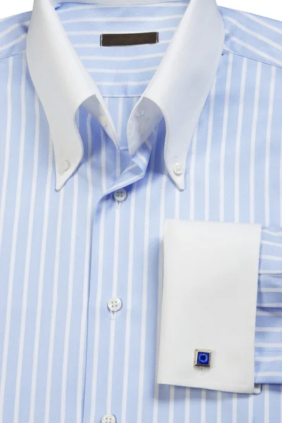 Cufflink on blue striped shirt
