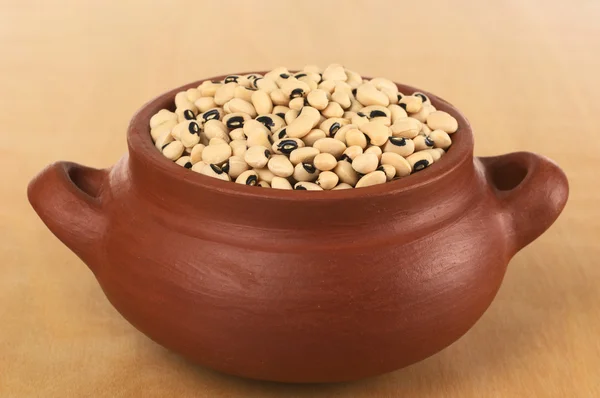 Raw Black-Eyed Peas in Rustic Bowl