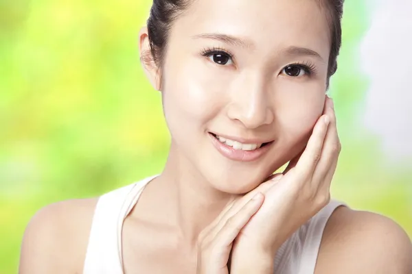 Beautiful asian young woman with skin care