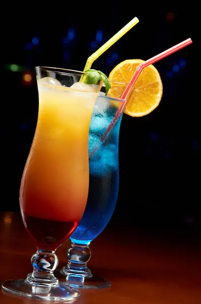 Two colorful cocktails