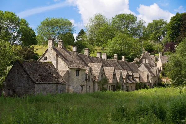 Arlington Row in Bibury with River Coln, Cotswolds, Gloucestershire, UK