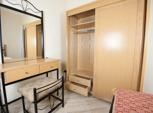 Dressing table and wardrobe in bedroom