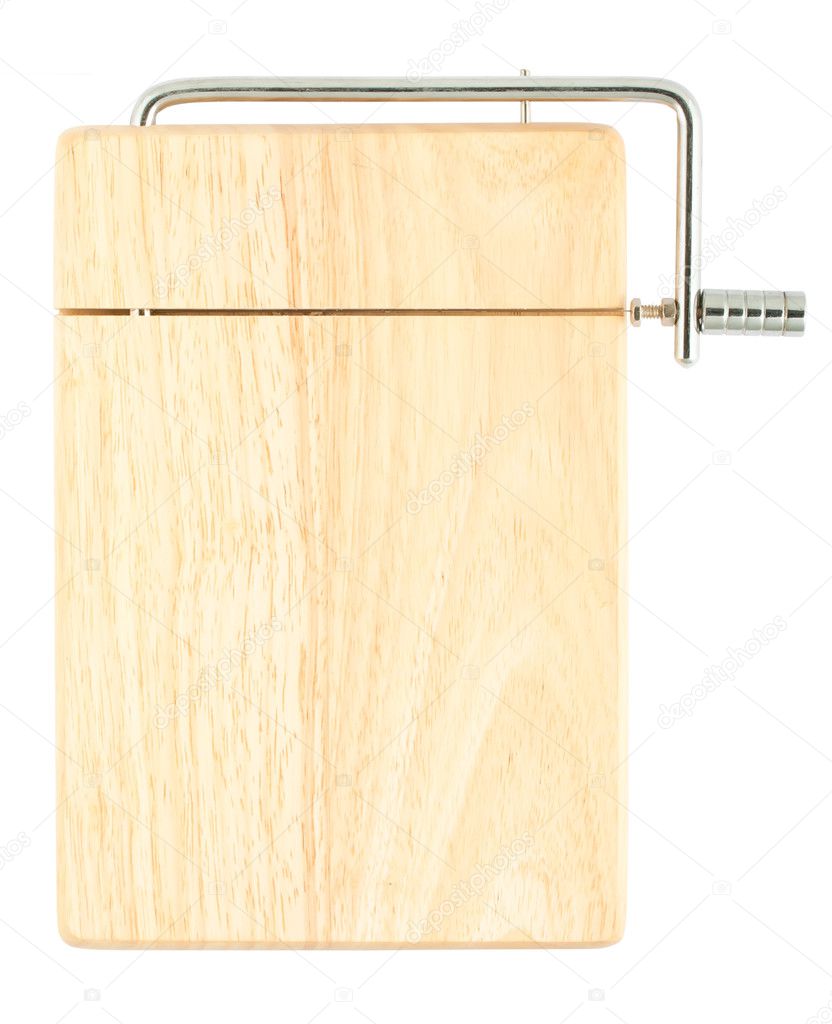 Wooden chopping board with cheese cutter isolated on white —Photo by 