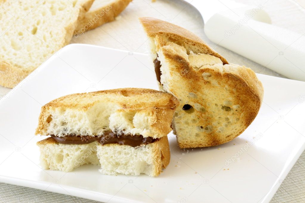 Delicious hazelnut and chocolate spread sandwich — Stock Photo