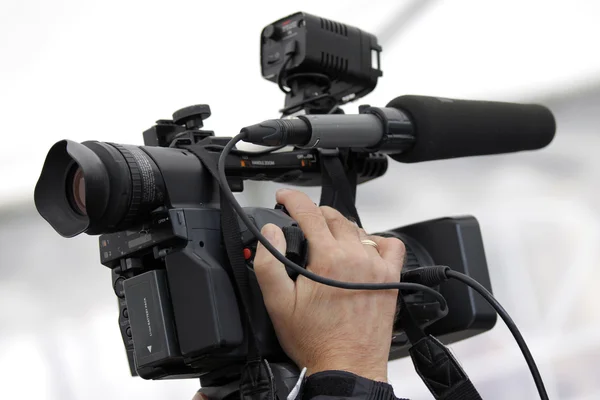 Cameraman and video camera