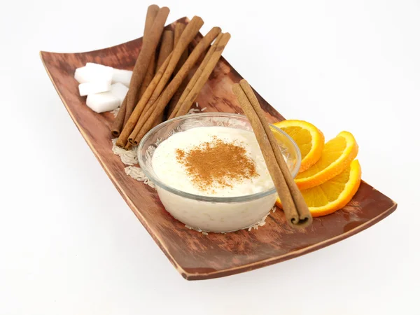 Creamy rice pudding with cinnamon and orange