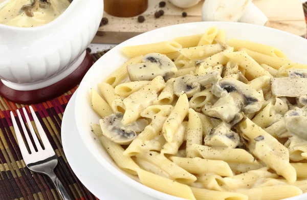 Penne pasta with mushroom cream