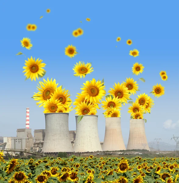 Sunflowers come out from chimneys of a power plant