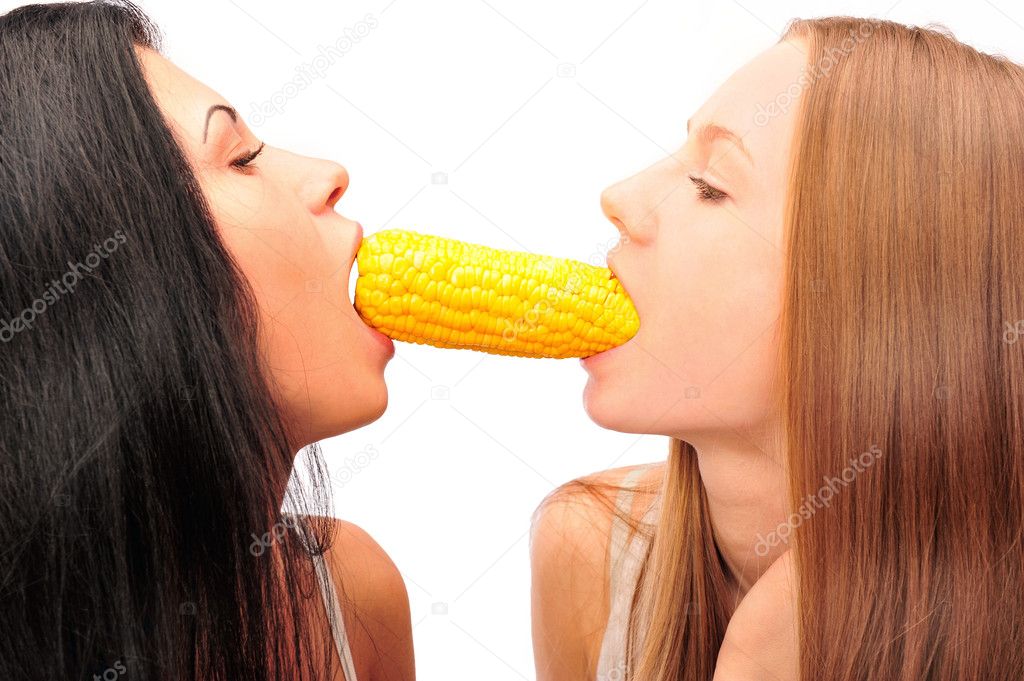 depositphotos_-stock-photo-two-women-eating-corn-at