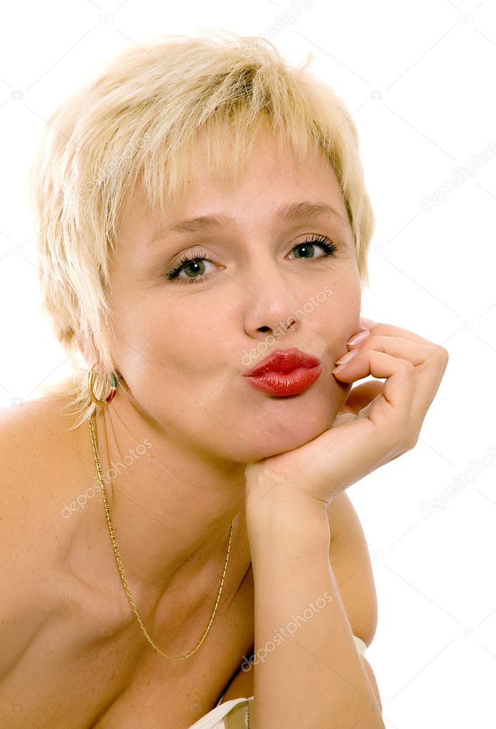 Close Up Of Beautiful Blonde Woman Blowing Kiss Stock Photo Meggan