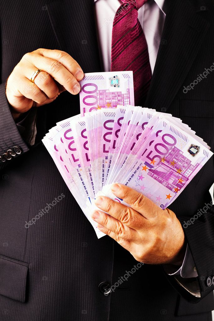 depositphotos_6132208-Manager-with-lots-of--500--euro-banknotes.jpg